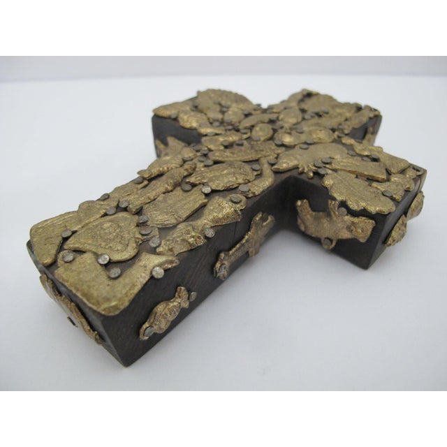 Stunning hand crafted Mexican folk art Milagros cross. Thick hand carved dark wood heavily embellished with gold tone...