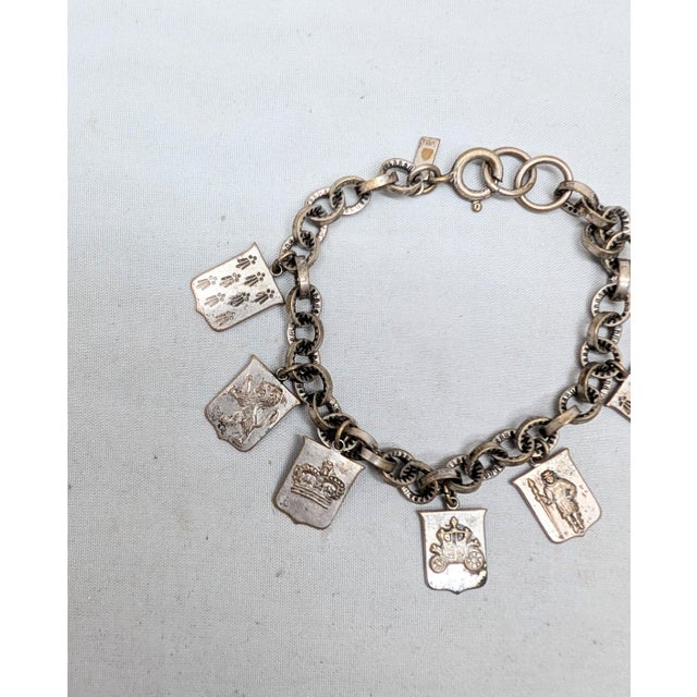 1930s Vintage 1930s Signed Monet Silvertone Coat of Arms Charm Bracelet For Sale - Image 5 of 8