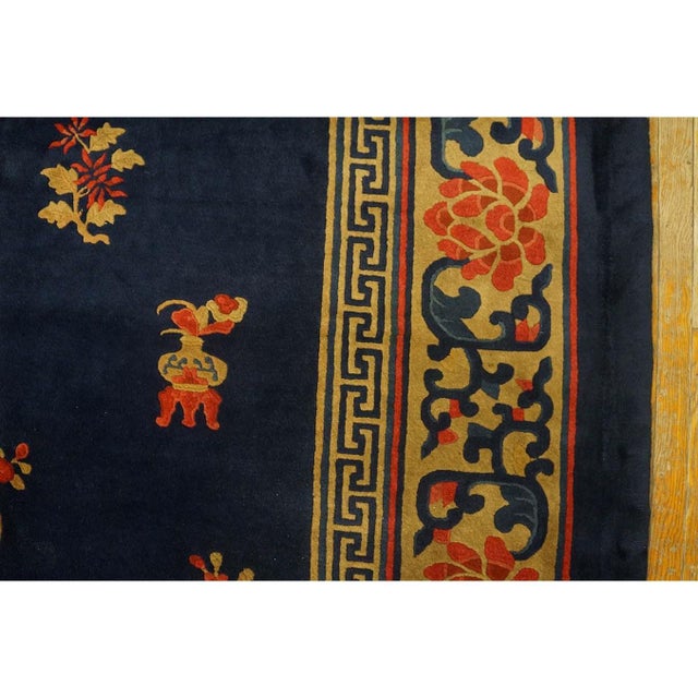 Antique Peking Room Size Wool Blue Navy Rug, Circa Date: 1920s. This exceptional Chinese weaving captures the elegance of...