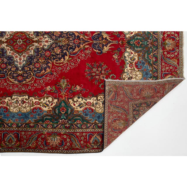This Vintage Handmade Persian Tabriz Wool Rug in a Rich Red With a Rosette Motif For Sale - Image 4 of 10