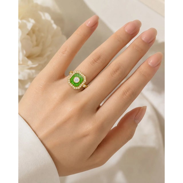 Exquisite 14K yellow gold Art Deco-inspired mosaic ring featuring a dazzling white sapphire at the center, accented by...
