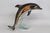 This Figurine is made of porcelain. This Dolphin Figurine was made in Germany by Goebel, it is stamped, and marked CS 209,...