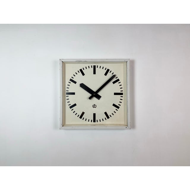 This station wall clock was made by CTW (Carl Theodor Wagner) in Wiesbaden, West Germany during the 1960s. It features a...