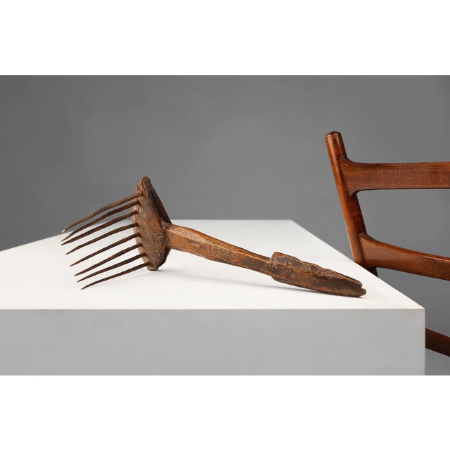 An exceptional 16th‑century French wool comb, hand‑carved in wood and iron, showcasing the utilitarian beauty of early...