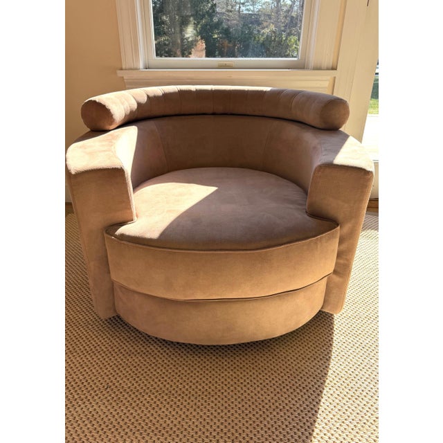 Roche Bobois Sculptural Circular Camel Suede Horseshoe Swivel Lounge Chair A circular swivel lounge chair by Roche Bobois,...