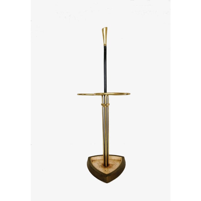 A refined German made umbrella holder/stand is in black and gold, made of brass and cast iron. The design is so rare that...