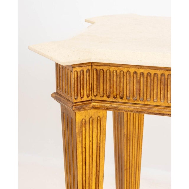 George III Style Travertine Top Giltwood Console Table, with four fluted tapered legs. 29.75" H x 77.5" W x 25" D....