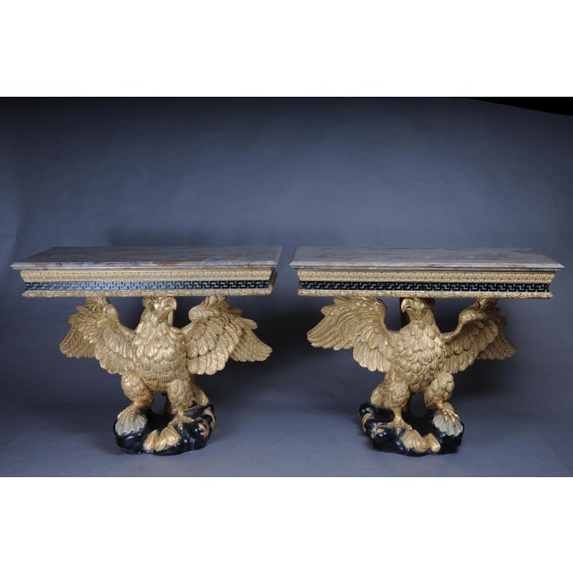 A pair of magnificent eagle consoles designed by William Kent 1685-1748 A few (2) consoles from the Régence era....