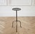 Cannes small iron drink table in Iron finish. Inspired by the antique version, this small drink table is forged iron with...