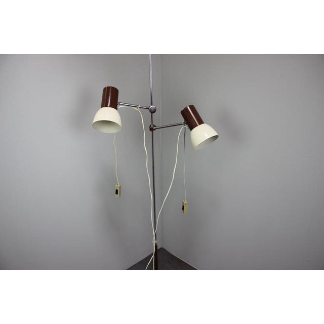 Elegant vintage Napako floor lamp manufactured in Czechoslovakia during the 1970s, featuring two adjustable cream and...