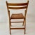 Four vintage wood slat folding chairs with functional details. Extremely sturdy. Made in Yugoslavia. This classic design...