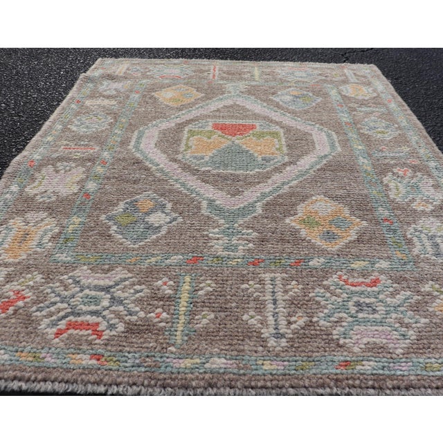 Small Turkish Oushak Rug With Soft Brown Ground and Geometric Pastel Motifs For Sale In Atlanta - Image 6 of 10