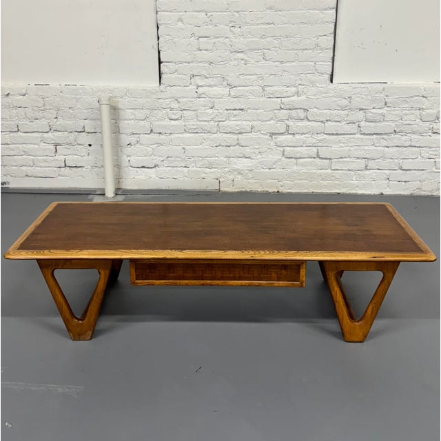 One of Lane Furniture's more popular mid century modern series was the Perception line. Here's a single drawer coffee...