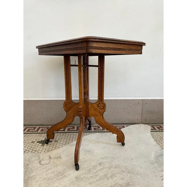 Late 19th Century Antique Victorian Carved Quarter Sawn Oak Parlor Table on Casters, Eastlake Style For Sale - Image 5 of 18