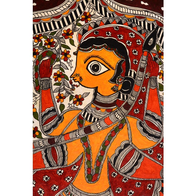 This exquisite hand-painted Madhubani painting by Mamta Devi, recipient of the National Award in 2016, depicts Lord...