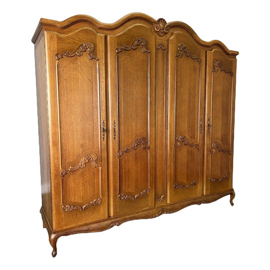 Vintage French Louis XVI Style Carved 4-Door Armoire For Sale