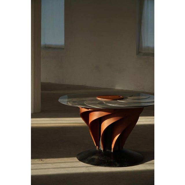 A sculptural and technically sophisticated dining table designed and crafted by Danish designer Nils-Ole Zib in 1990. The...