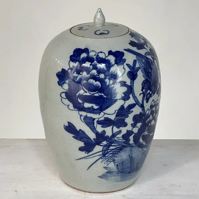 19th Century Chinese Blue & White Lidded Urn was designed for shelf, sideboard or mantel display, with an elaborate flora...