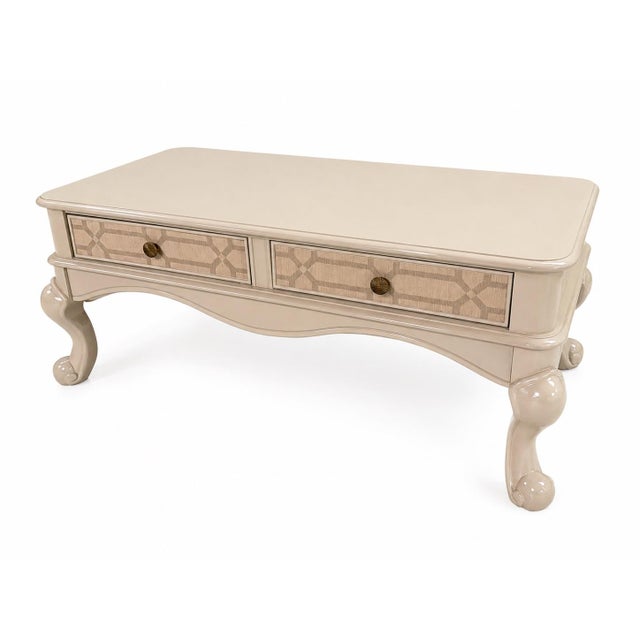 Exquisite fully refinished coffee table with stylish pattern matched wallpaper residing in the inset areas. Solid wood...