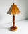 Unique mid-20th-century folk art style table lamp. Handmade base and shade constructed from cedar wood. Features solid...