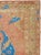 This mid-20th-century Turkish Anatolian throw rug presents a balanced floral composition centered on a vivid turquoise-...