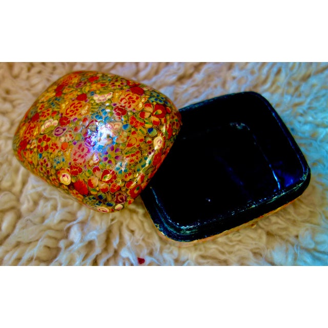 Exceptional handpainted, gilt, lacquered Kashmiri box. Solid with tiny florals of deep rose, cream, sea blue, pale green,...