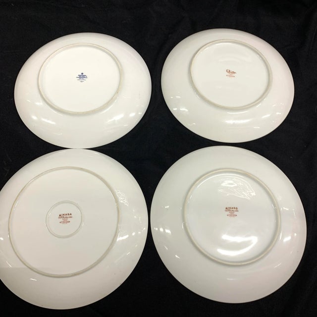 Mikasa Elite Trend Chop Plate, a set of four. These could be used as chargers under the dinner plates. Cool Mid Century...