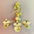 From Italy, a charming pair of Tôle Peinte floral candle wall sconces, made of hand-painted iron, circa mid 1900s. Showing...