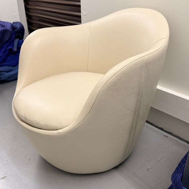 DWR Leather Lína Swivel Chair “I think ‘flow’ is a good word for it,” says designer Hlynur Atlason when asked to describe...