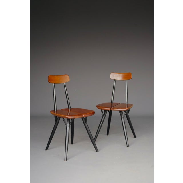 Two classic Pirkka range chairs by Finnish designer Ilmari Tapiovaara. Designed in the 1950s these chairs are fantastic...