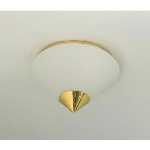 A wonderful pair of German 1990s golden brass and white cone shade flush lights by JT kalmar. Rewired.