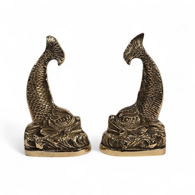 For your consideration this lovely pair of intricately cast 1960's brass dolphin fish bookends. Made in Korea with...