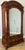 An exceptional Antique French burr walnut wardrobe featuring a beautifully shaped mirrored door, rich figured walnut...