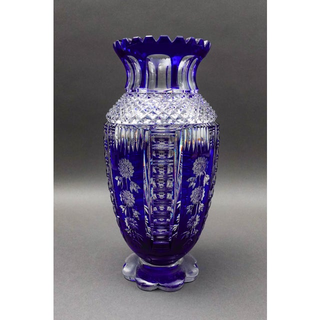 Bohemian Czech Cobalt Blue Cut To Clear Crystal Vase With Sawtooth Rim. Measures approximately 6" diameter, 12 1/2" high.