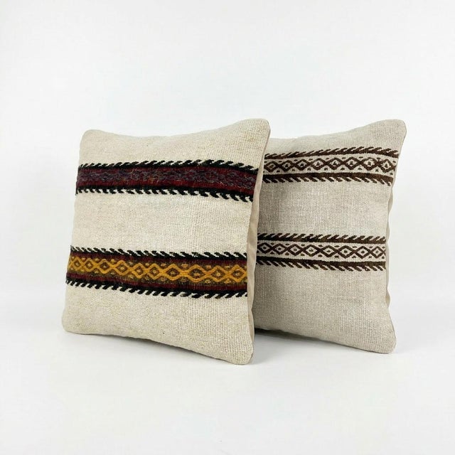 This beautiful 16'' X 16'' pillow cover set was made from authentic Turkish Kilim pieces. Bright colors of wool adorn the...