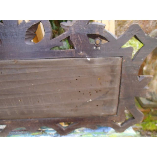 A very special antique towel holder, with wonderful carving, floral, butterfly embroidery and a glass rod. There are old...