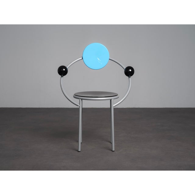 An iconic pair of first chairs designed by michele de lucchi for memphis milano in 1981. The design perfectly captures the...