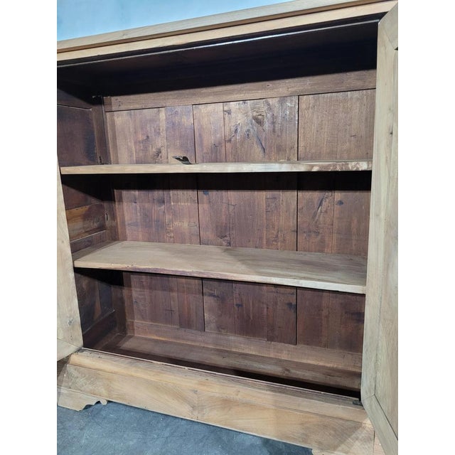 Solid walnut bassette cabinet from the Louis Philippe period. This small cupboard is frosted, giving it a gummed and very...