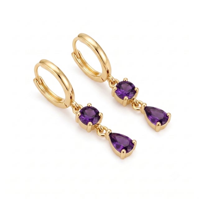 Imbue your style with royal radiance using these mesmerizing purple drop earrings. Plated in gleaming 18k yellow gold,...