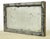 Reclaimed rectangular shaped window with a wood frame, steel sides, and a clear wormy chicken wire glass pane. It was...
