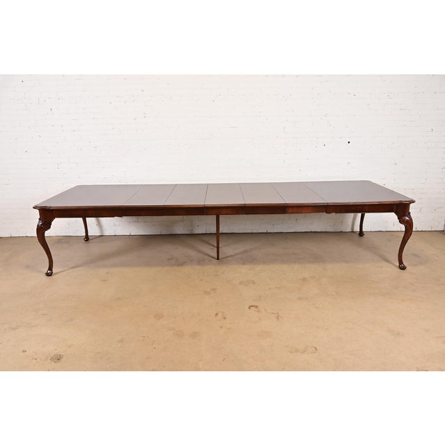 An exceptional Queen Anne, Georgian, or Chippendale style monumental extension dining table By Saybolt Cleland USA, Circa...