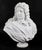 A beautifully sculpted antique Italian Carrara marble bust of a Nobleman in armour, mid-20th century in date. The subject...