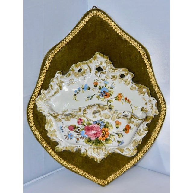 A stunning and rare Italian Maiolica pottery wall pocket. Ornate pocket is hand-painted flowers and scrolls in vivid...