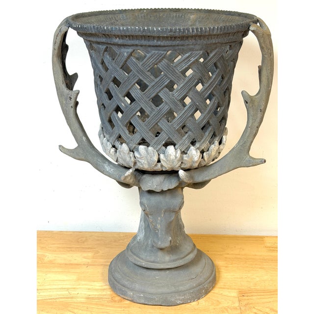 This monumental J.W. Fiske–attributed polychromed lead urn represents a sophisticated synthesis of 19th-century American...