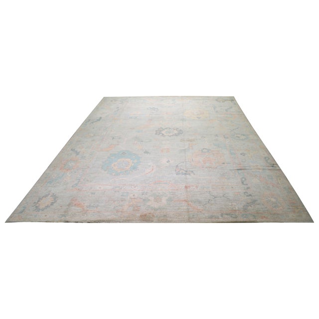 Hand-knotted with care using traditional rug making techniques, this wool rug blends timeless craftsmanship with a modern...