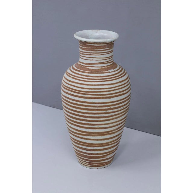 Swedish ceramic floor vase designed by Anna-Lisa Thomson. Manufactured by Upsala – Ekeby at Uppsala, circa 1940s. Glazed...