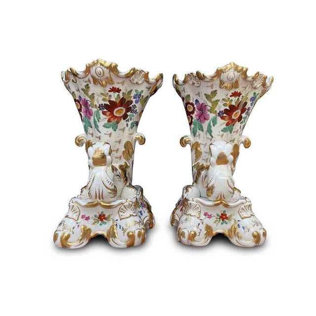Pair of French Porcelain Cornucopia Vases, Late 19th Century. An elegant pair of late 19th-century neo-rocaille tulip...