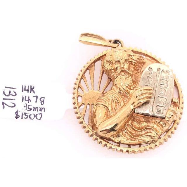 14 Karat Yellow and White Gold Religious Pendant Charm 14.7 grams total weight. 35 mm diameter
