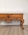 A vintage Baroque-style pine center table inspired by Portuguese design.