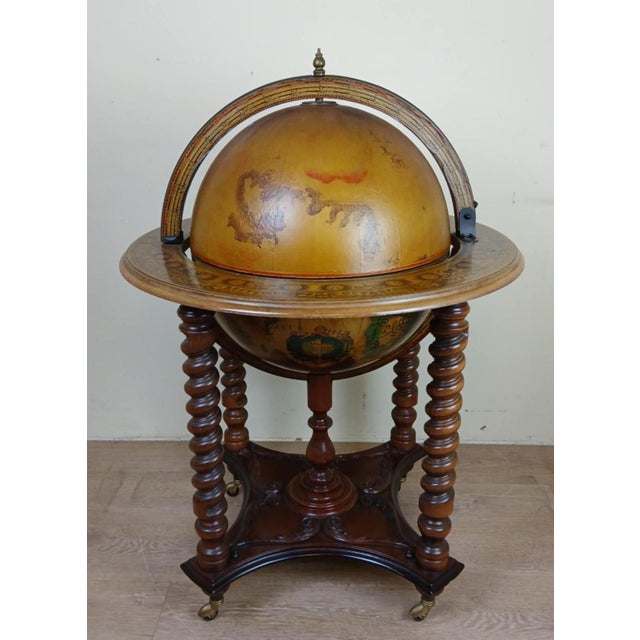 Vintage iconic world map cocktail bar furniture from the 1970s made of wood and papier-mâché chic furniture for a shocking...